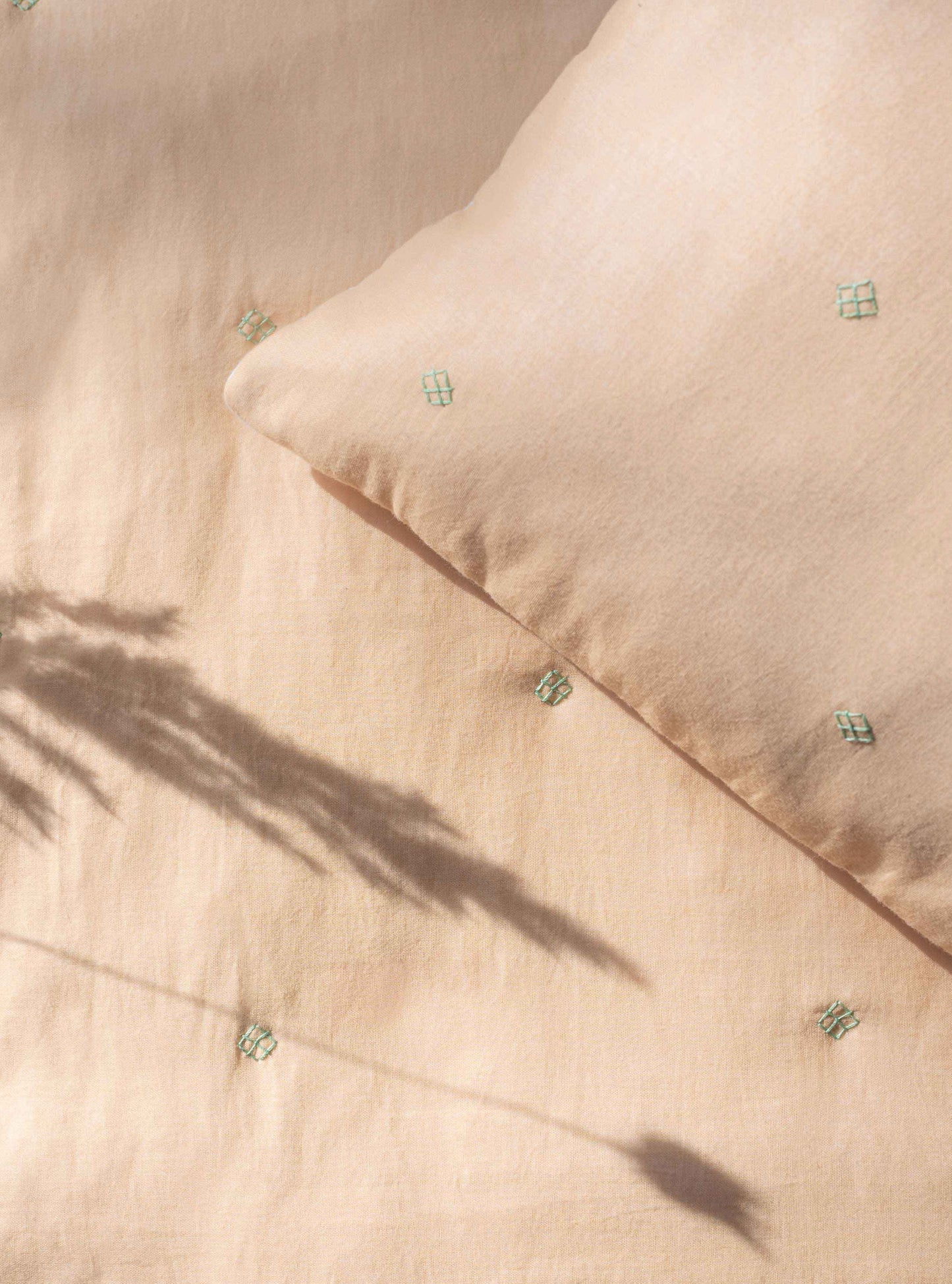 Bandook wheat pillow and blanket with green blue embroidery