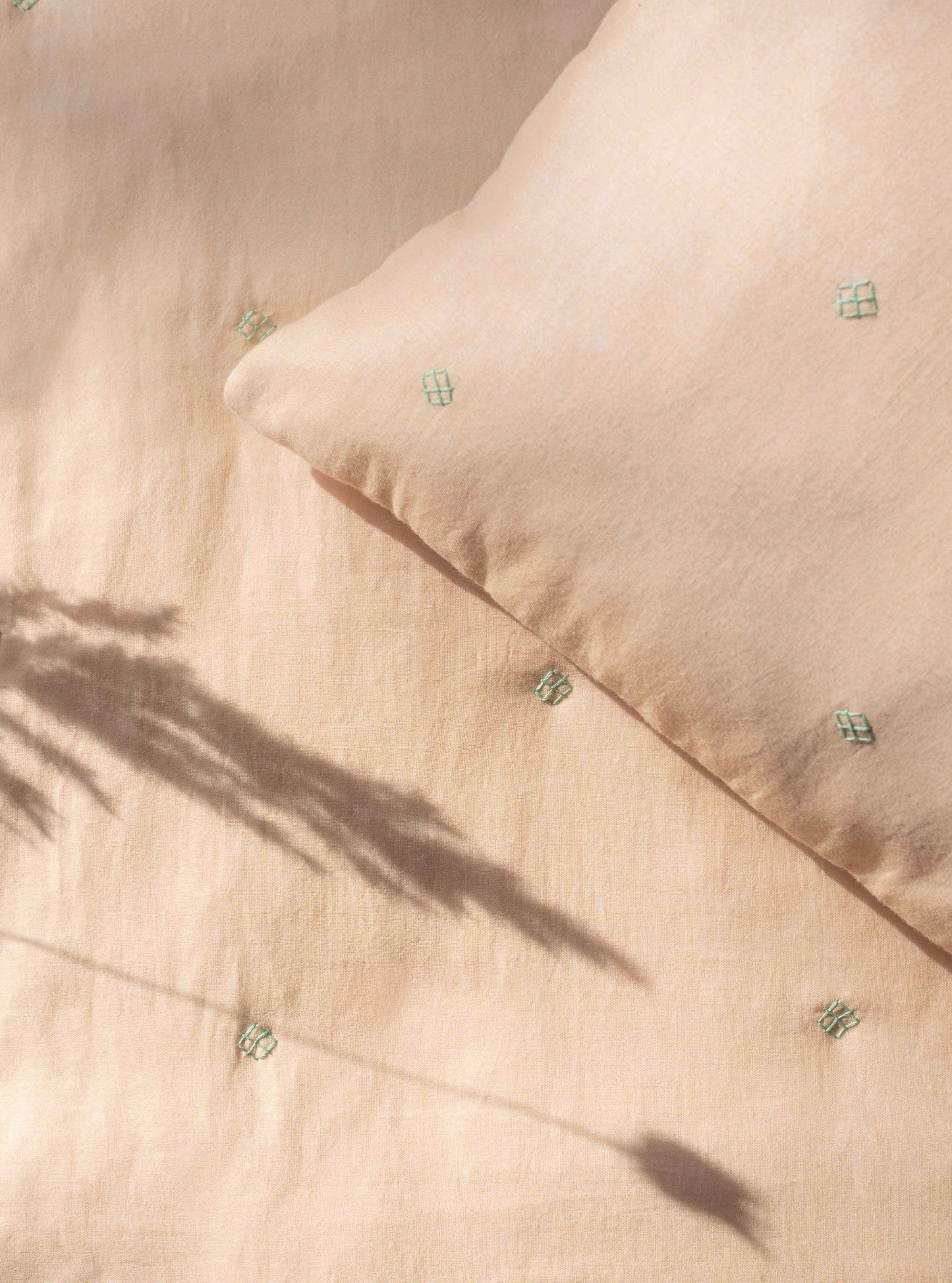 Bandook wheat pillow and blanket with green blue embroidery