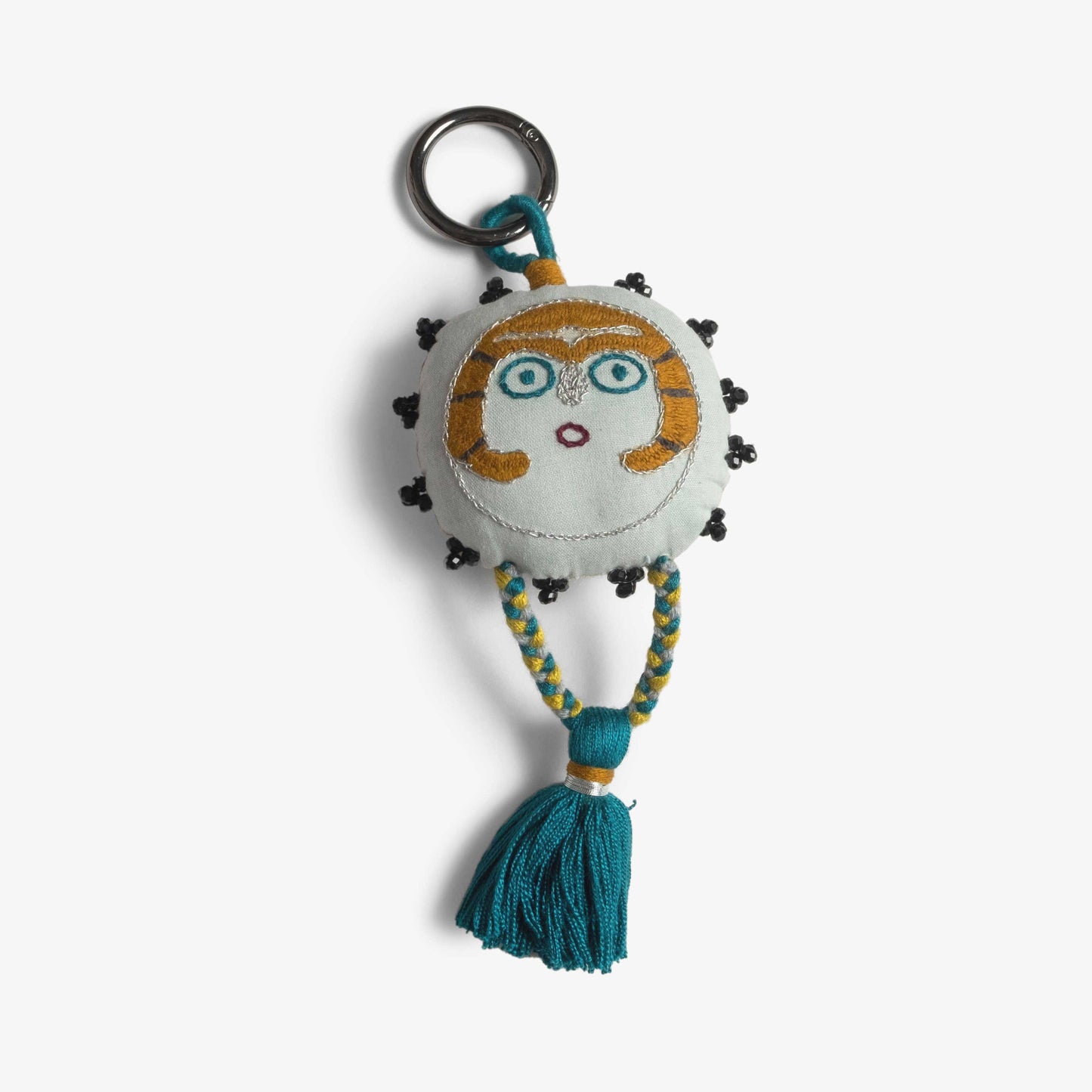 Silver Gray Sun Lady charm with embroidery and a braided tassel