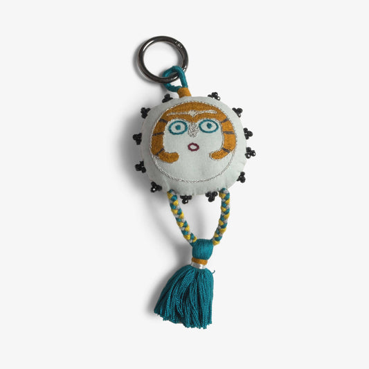 Silver Gray Sun Lady charm with embroidery and a braided tassel