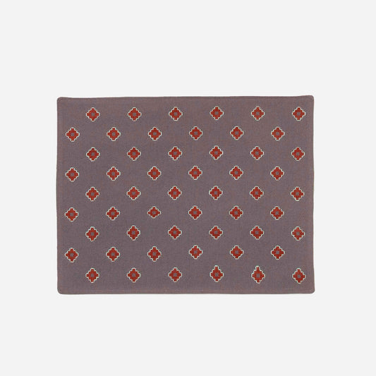 Dove grey Apadana placemat with dark red flower embroidery