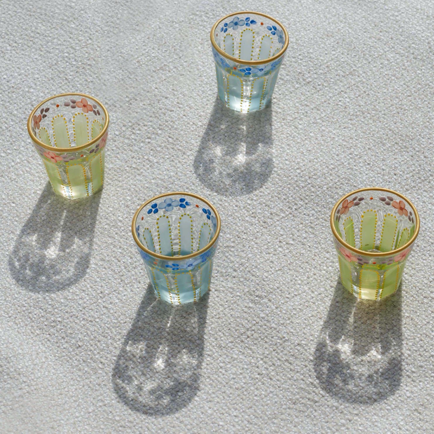 Nile blue and Lime Saghi shot glasses on a table