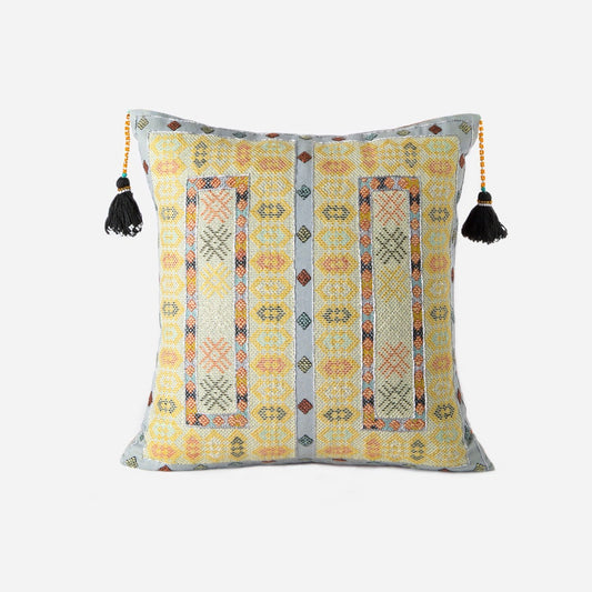 Sunlight yellow Zee square cushion with intense Baluchi embroidery and tassels